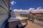 Soak in your private hot tub overlooking the picturesque Frisco Main Street
